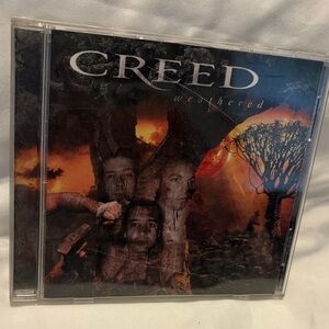 Creed CD — Orange, Black & Blue Artwork